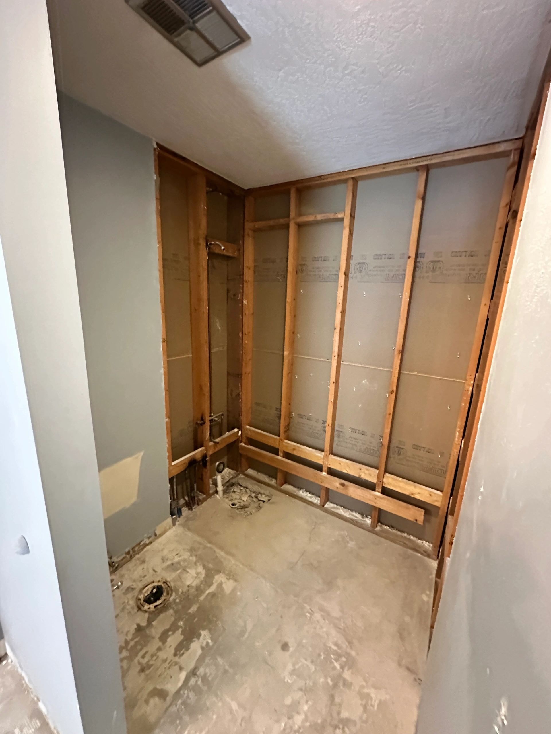 Bathroom remodel Oct 2025 — framing exposed
