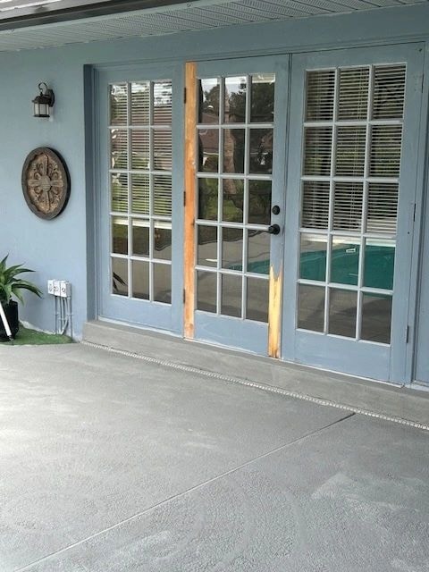 Light blue porch with glass French doors and shutters — British Heritage painting project